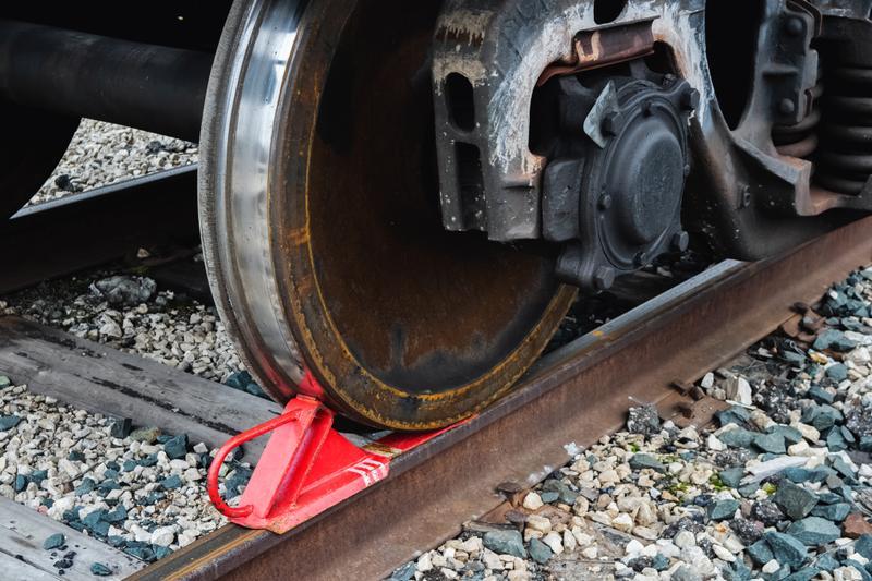 Vecteezy railway brake red shoe under the wheel of a train on rails
